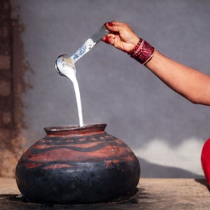 Heating Milk And Preparing Curd